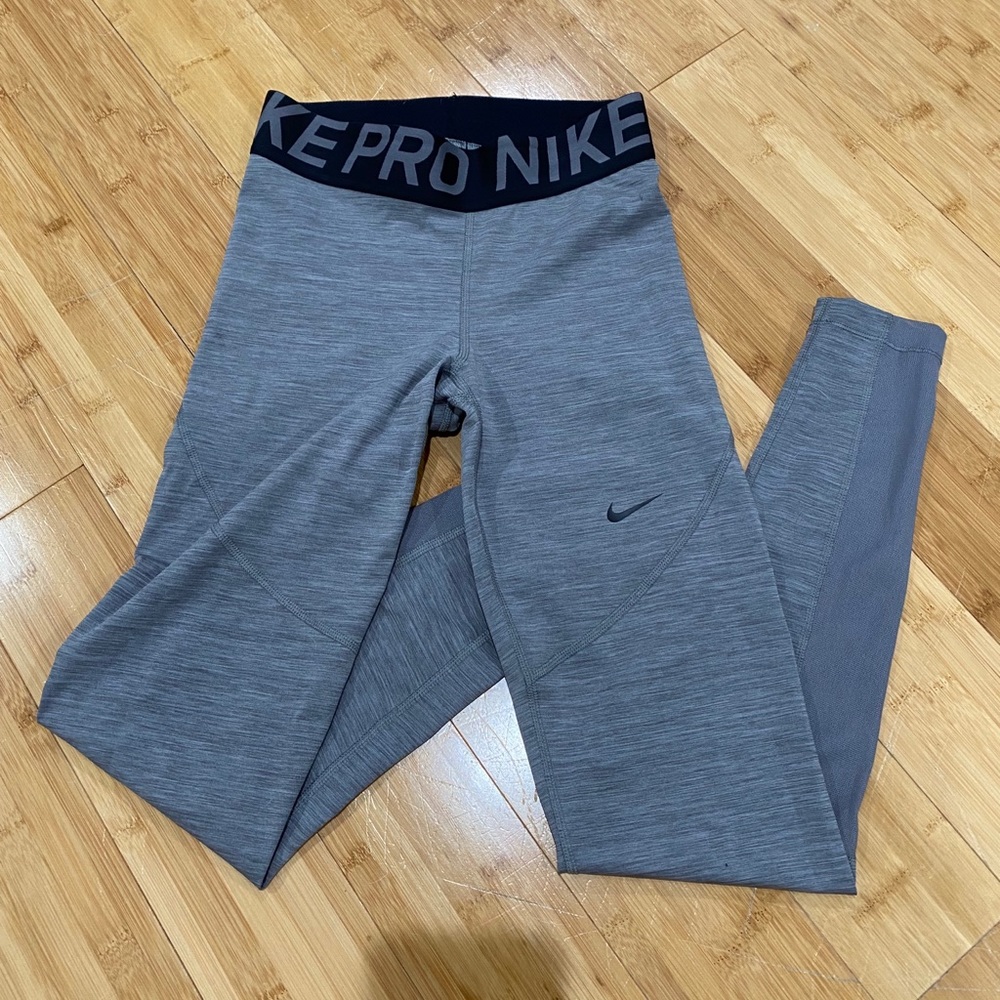 Nike pro leggings with mesh detail on the bottom.